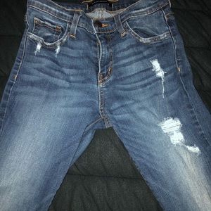 Straight legged ripped jeans